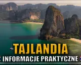 Widok z lotu ptaka na tropikalną zatokę w Tajlandii z wapiennymi klifami, plażą i łodziami.